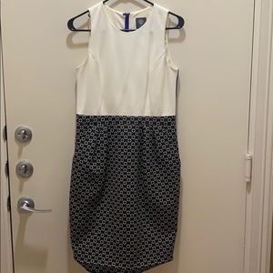 White top and black bottom shift dress